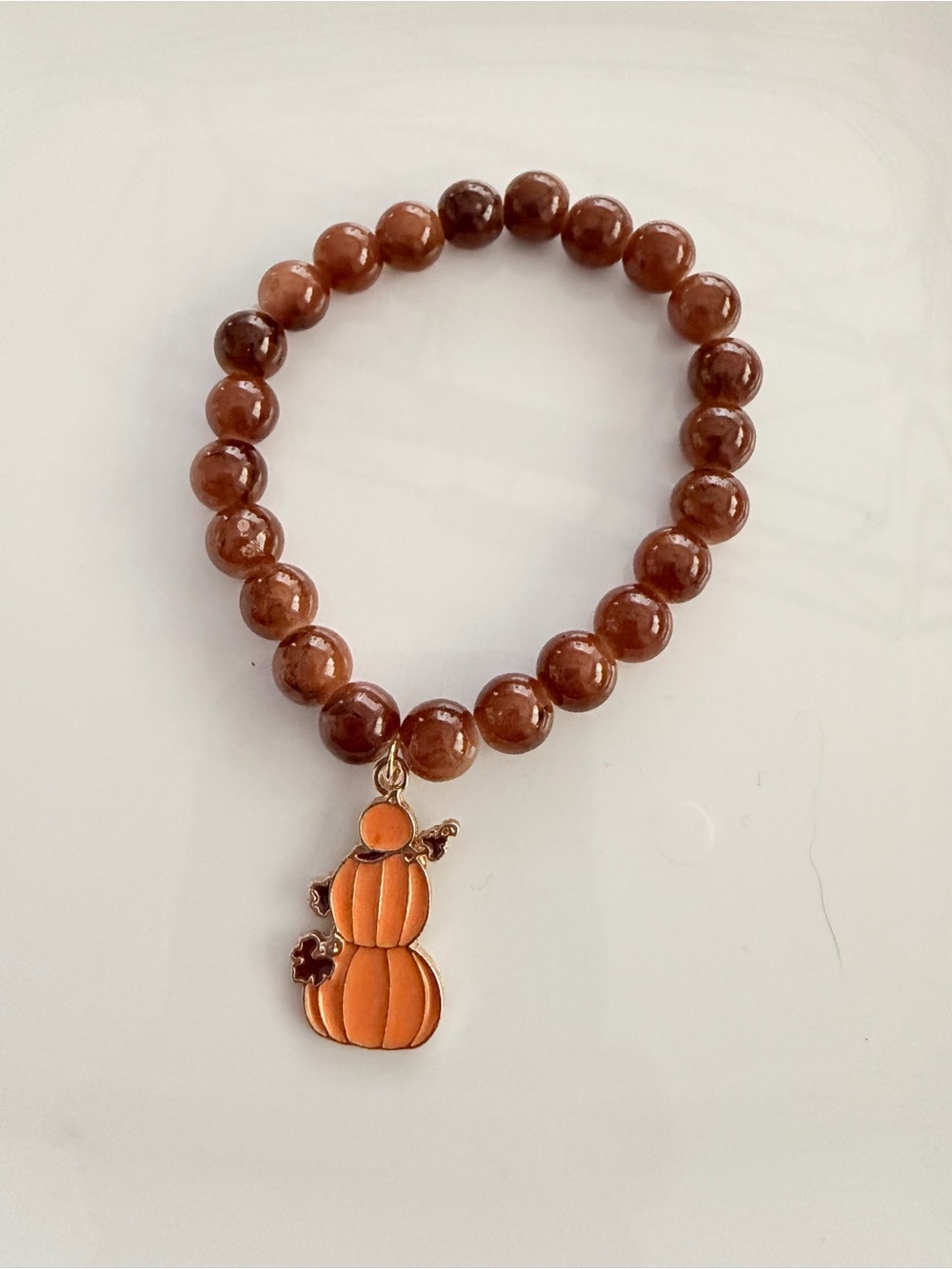 Brown Beaded Stretch Bracelet with Pumpkin Charm
